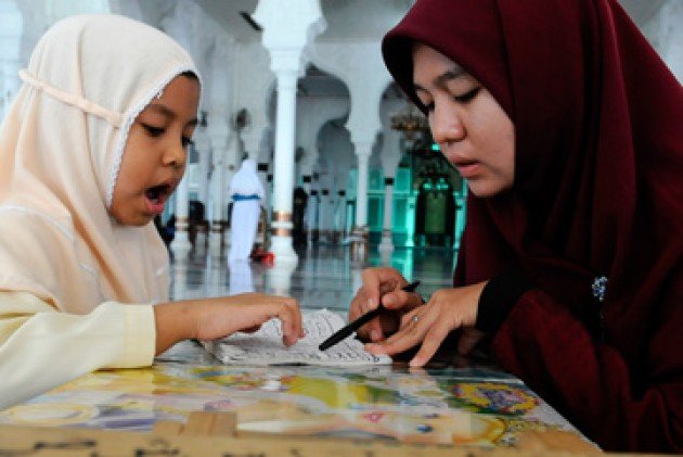 menyimak tilawah Al-Qur'an