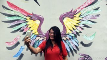 Gang Dolly, Bekas Lokalisasi Terbesar di Asia Tenggara Kini Telah Berubah Wajah Jadi Wisata Mural!