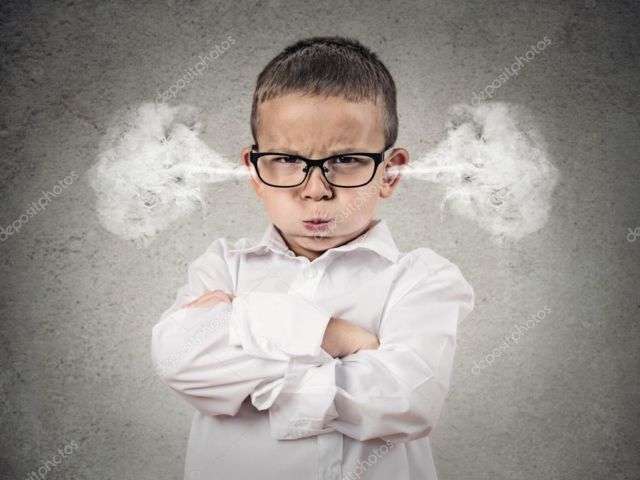 Angry upset boy, little man – Stock Image