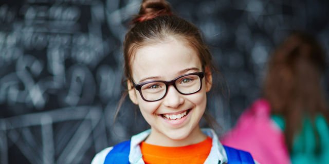 kid wearing glasses