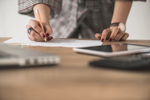 Woman Writing Paper