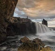 Menikmati Keindahan Pantai dan Air Terjun Sekaligus di Pantai Nambung