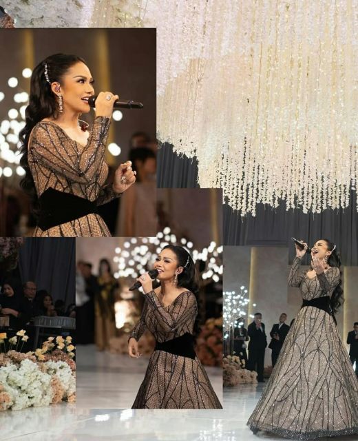 Artis berzodiak Aries Krisdayanti sedang bernyanyi