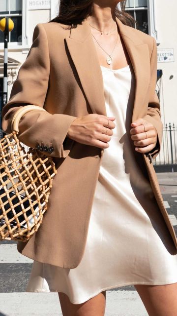 8 Outfit Earth Tone Wanita Buat Tampil Aesthetic Tanpa Ribet 15 nude-champagne satin slip dress + brown blazer