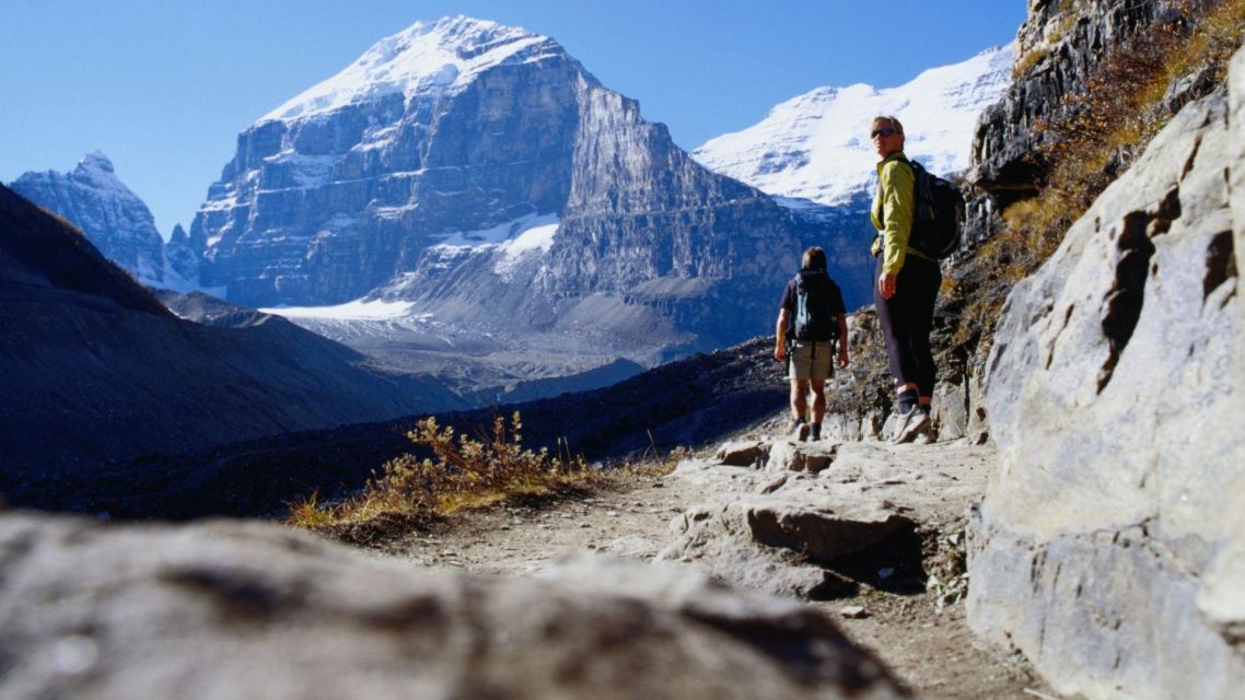 Hiking the Canadian Rockies: Exploring Banff and Jasper National Parks 7 Hikers exploring scenic mountain trails in the Canadian Rockies