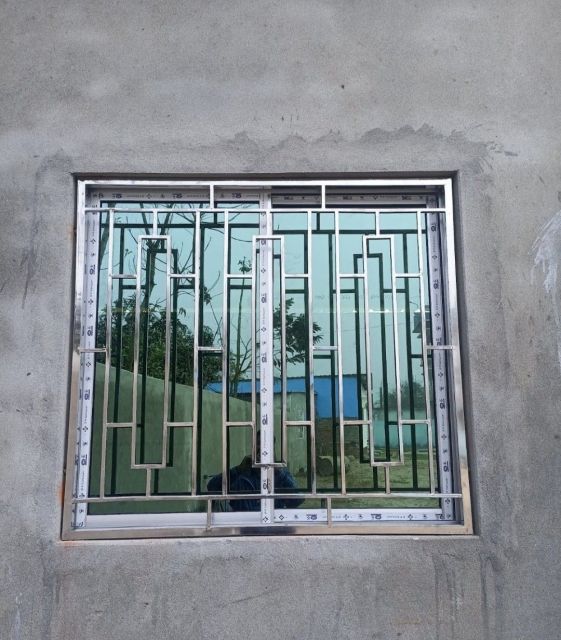 Inspirasi Model Teralis Jendela Minimalis untuk Fasad Hunian Modern 19 stainless steel grill for windows